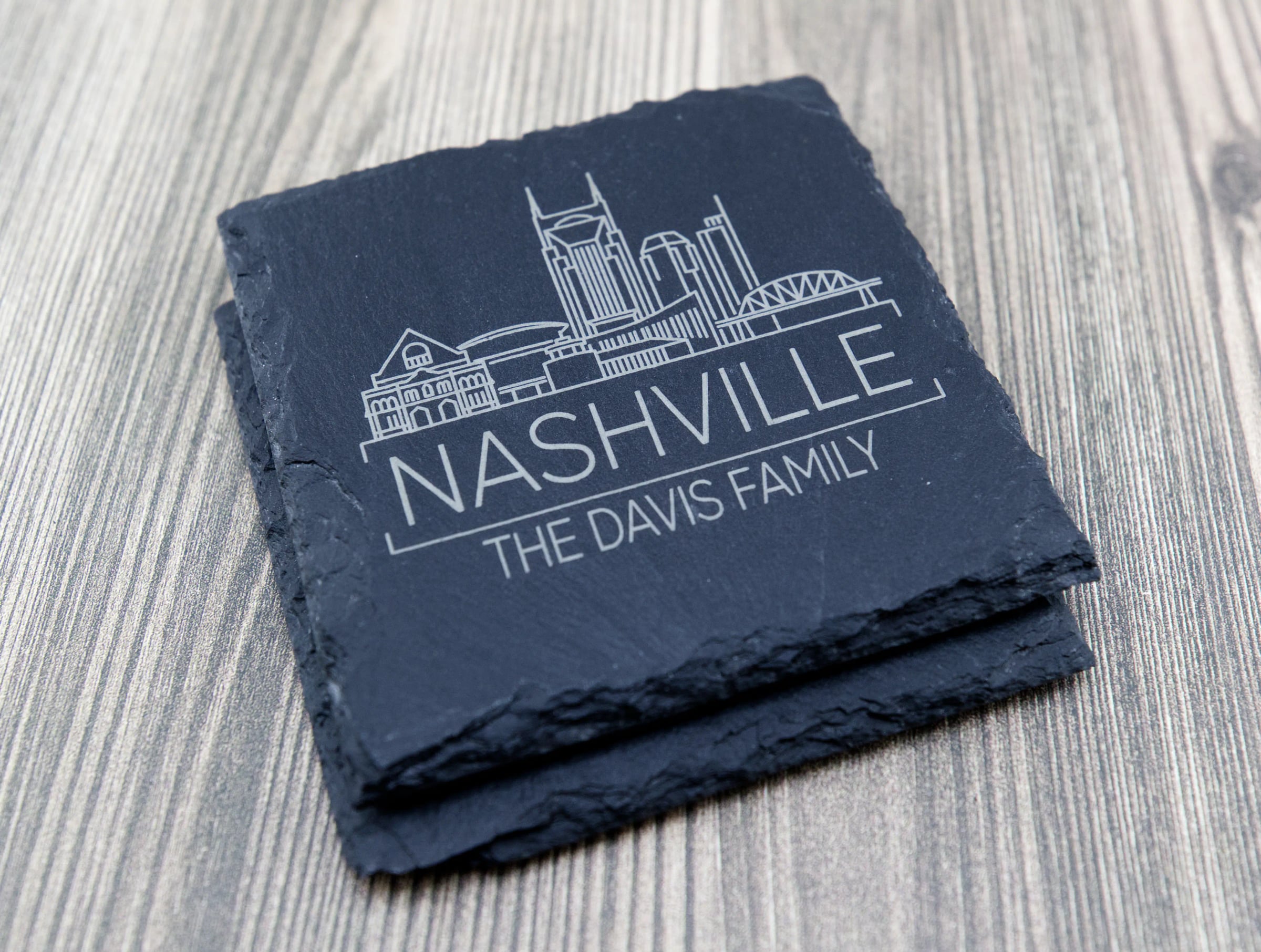 Engraved city skyline slate coasters, round and square