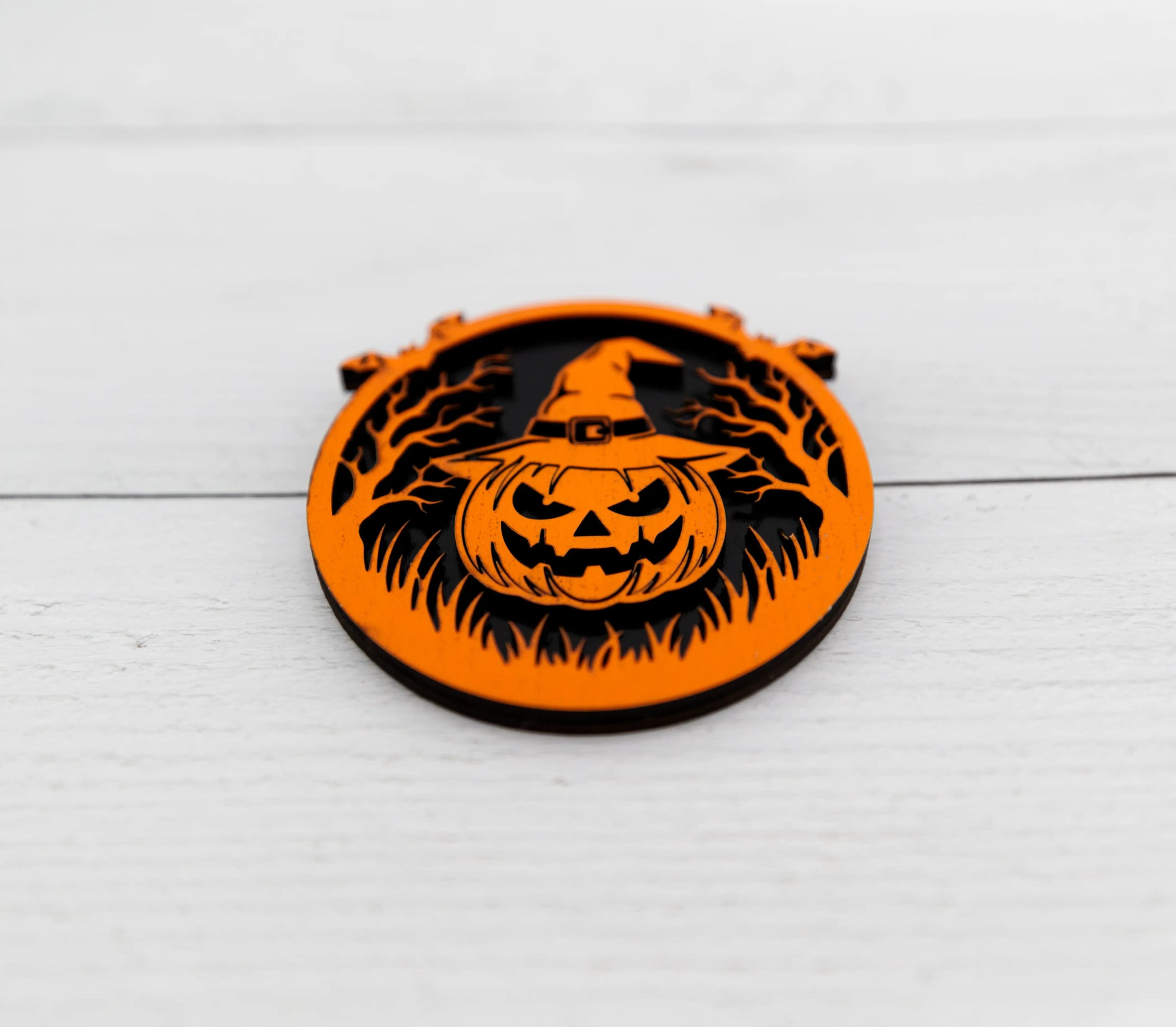 Close-up of the Witch's Pumpkin Halloween wood magnet