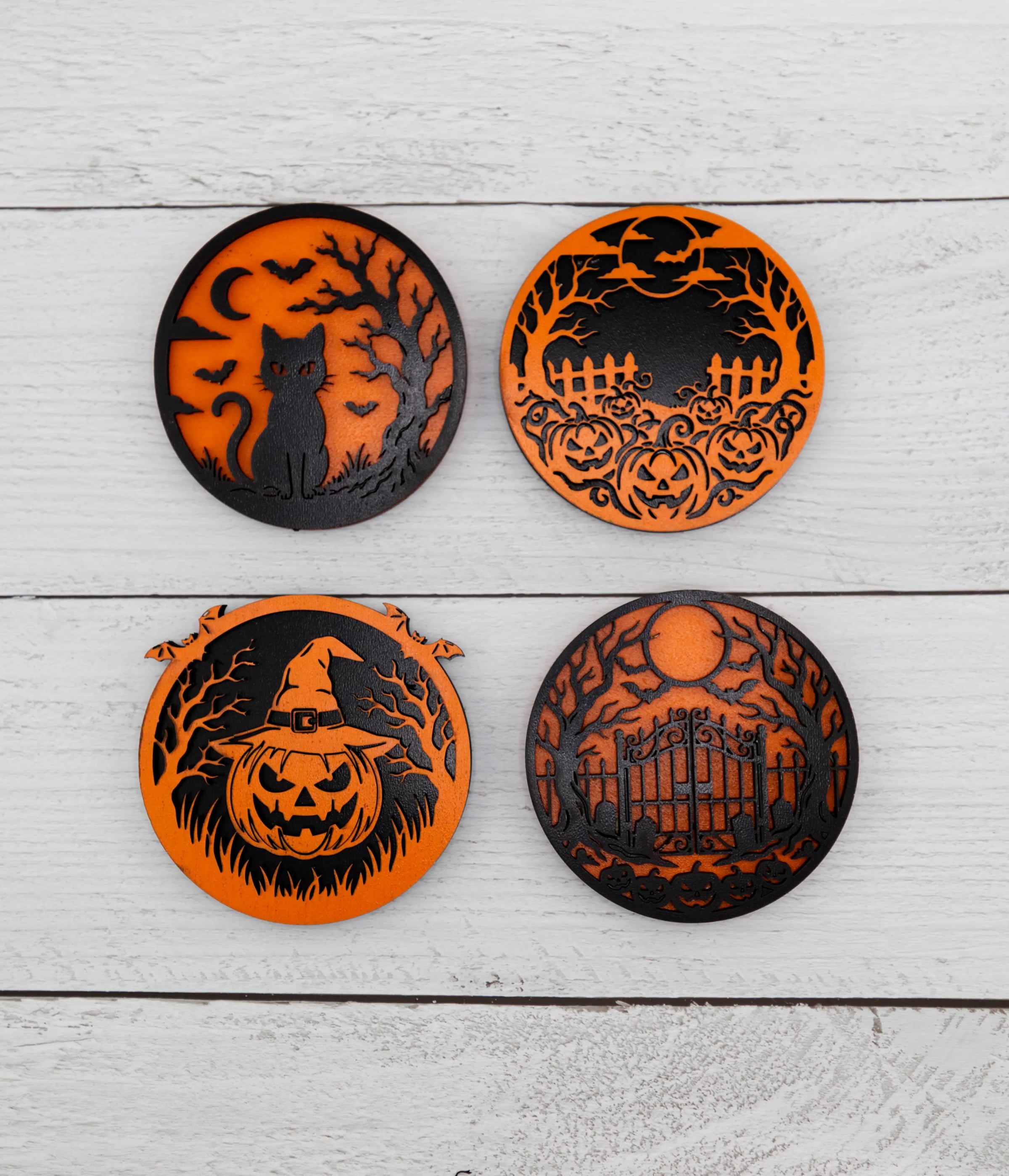 Four gothic Halloween wood magnets, laser cut and painted, made by BurnlineLab in Jurupa Valley, CA