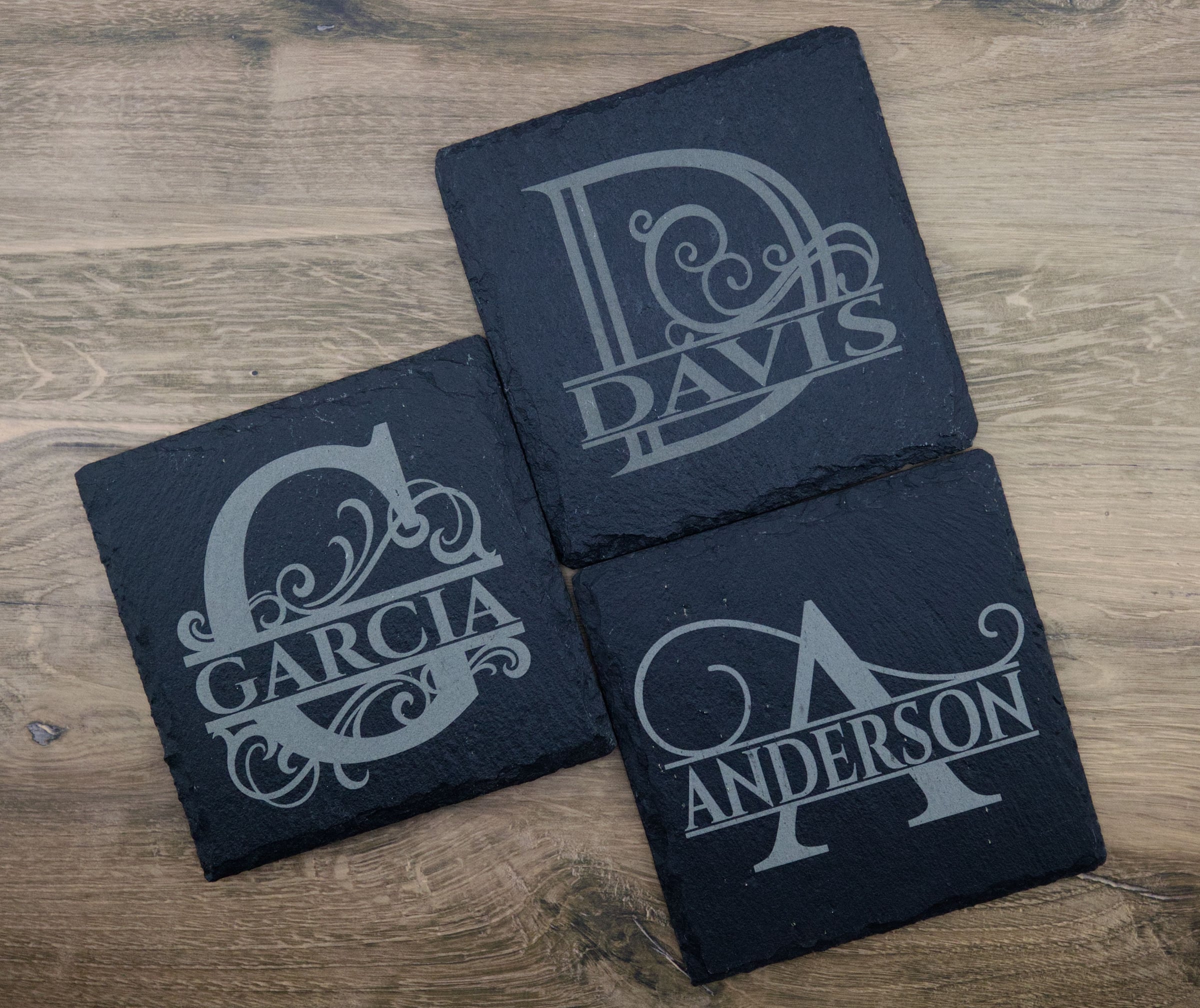 Custom split-monogram laser-engraved slate coasters made by BurnlineLab in Jurupa Valley, CA